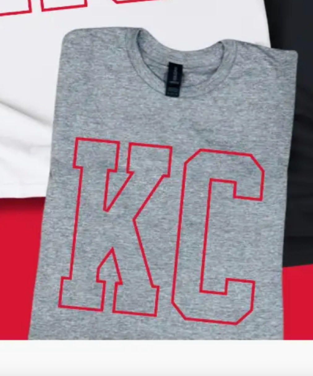 Red KC Letters on a Heather Gray Tee